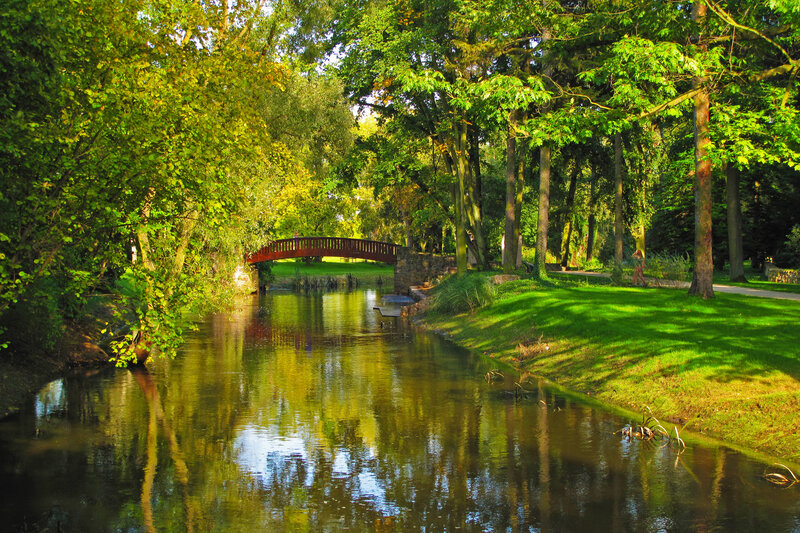Park river with red bridge