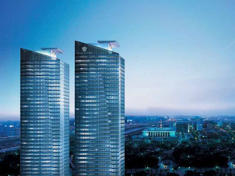 Park Suites towers at dusk