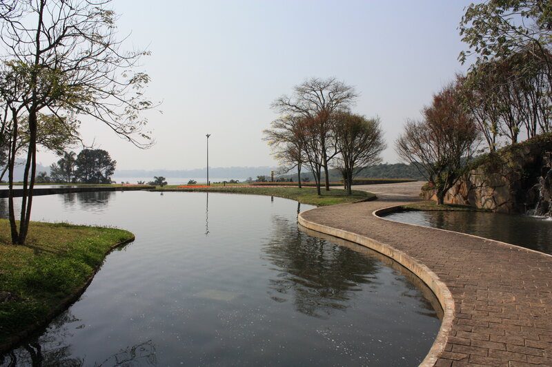 Park with curved waterway