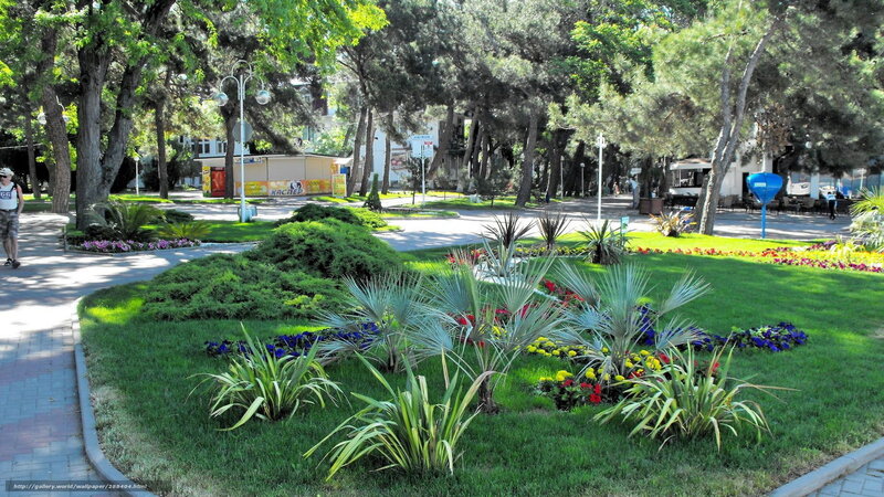 Park with flower beds and trees