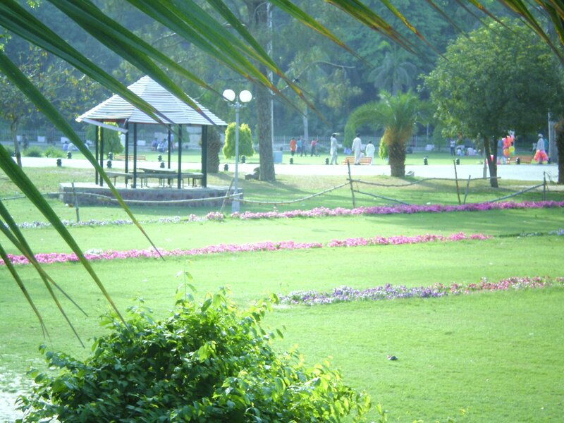 Park with gazebo and flowers