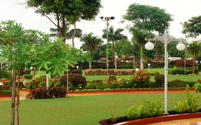 park with green lawn and trees