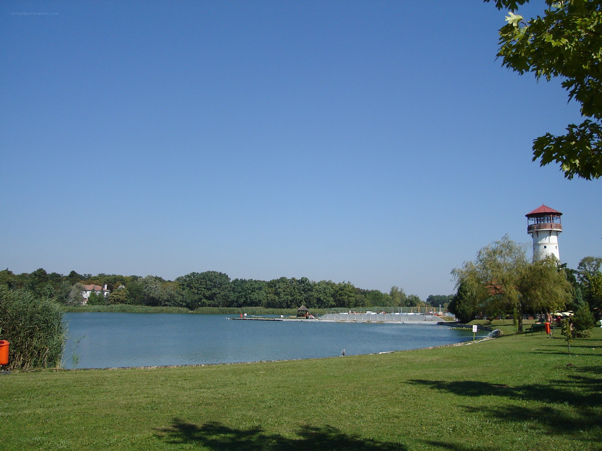 Park with lake and lighthouse