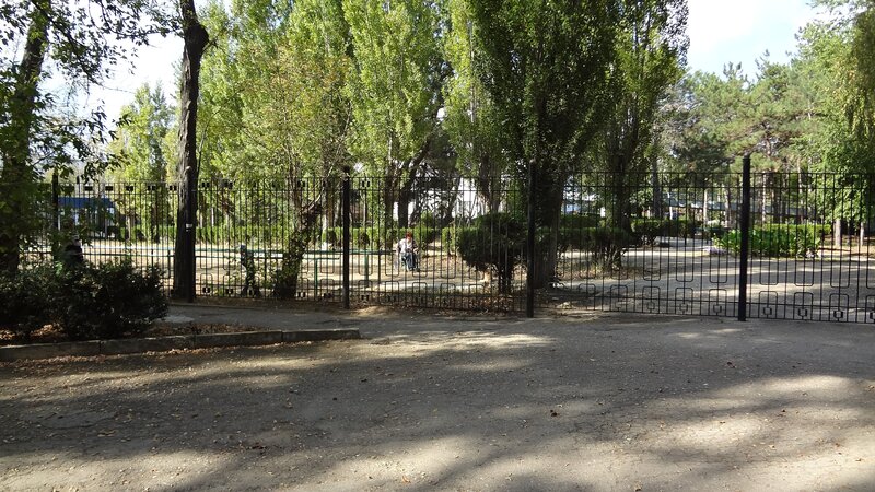 Park with metal fence