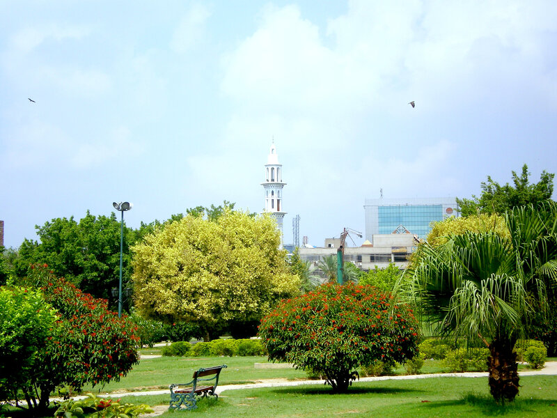 Park with mosque in background