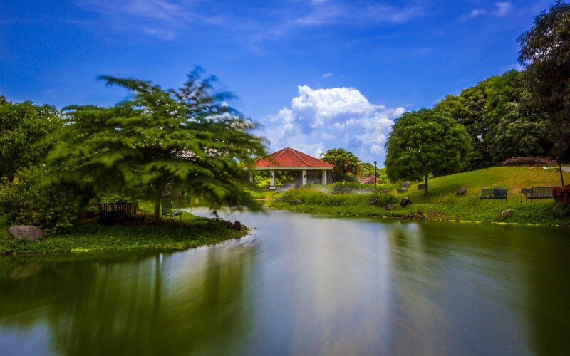 Park with pond and pavilion