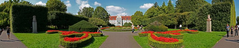 Park with red flower beds