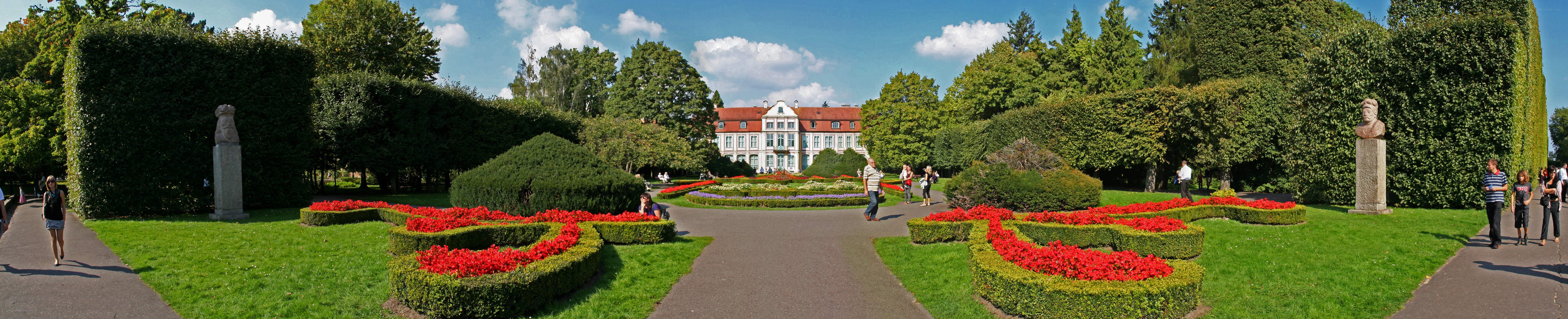Park with red flower beds