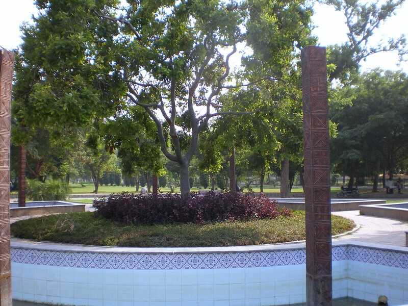 Park with tree and tiled fountain
