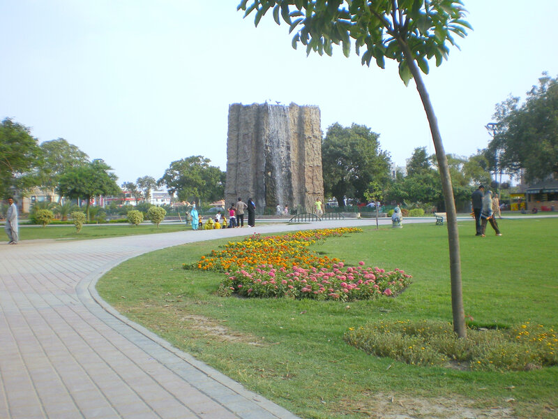 Park with waterfall monument