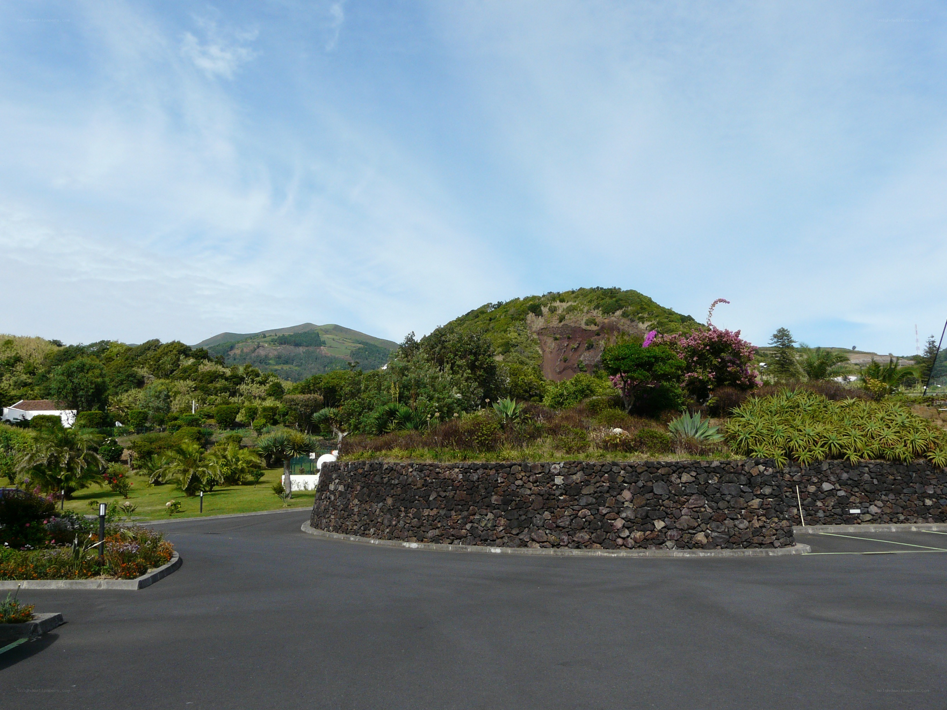 parking area with volcanic hill