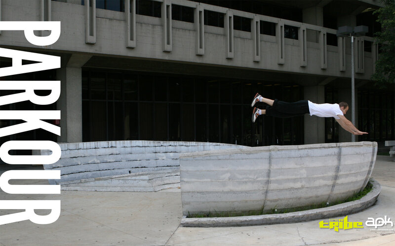 Parkour athlete in mid-air jump