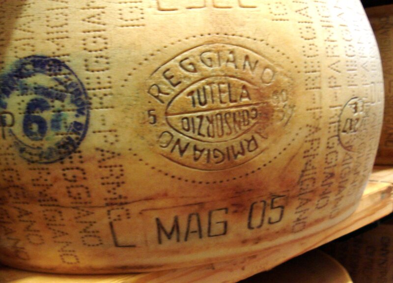 Parmesan cheese wheel with stamps