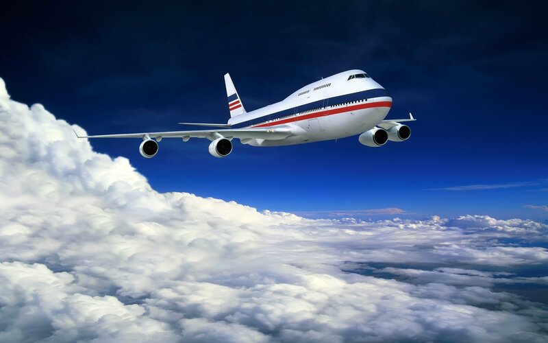 Passenger Airplane Flying — Blue, Dramatic