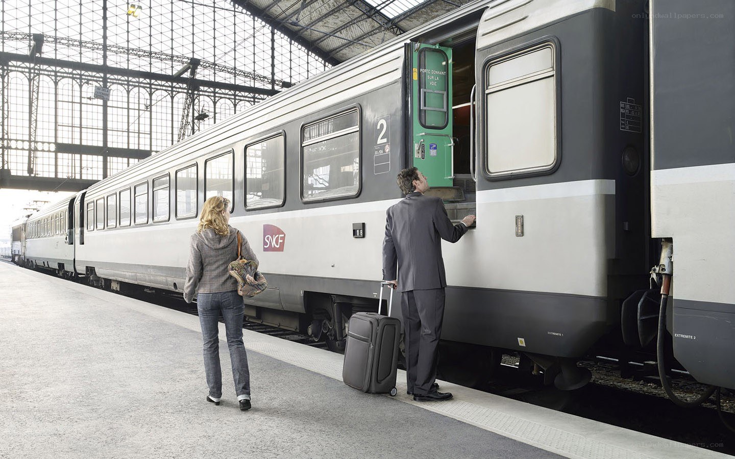 Passengers at a train station