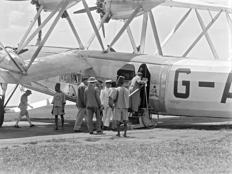 Passengers boarding a Royal Mail aircraft