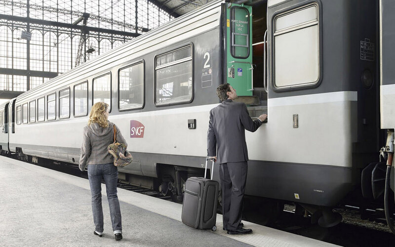 Passengers Boarding Train