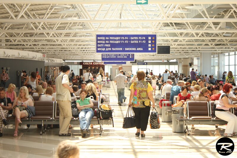 Passengers in airport terminal
