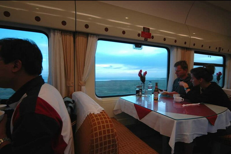 Passengers in Train Dining Car
