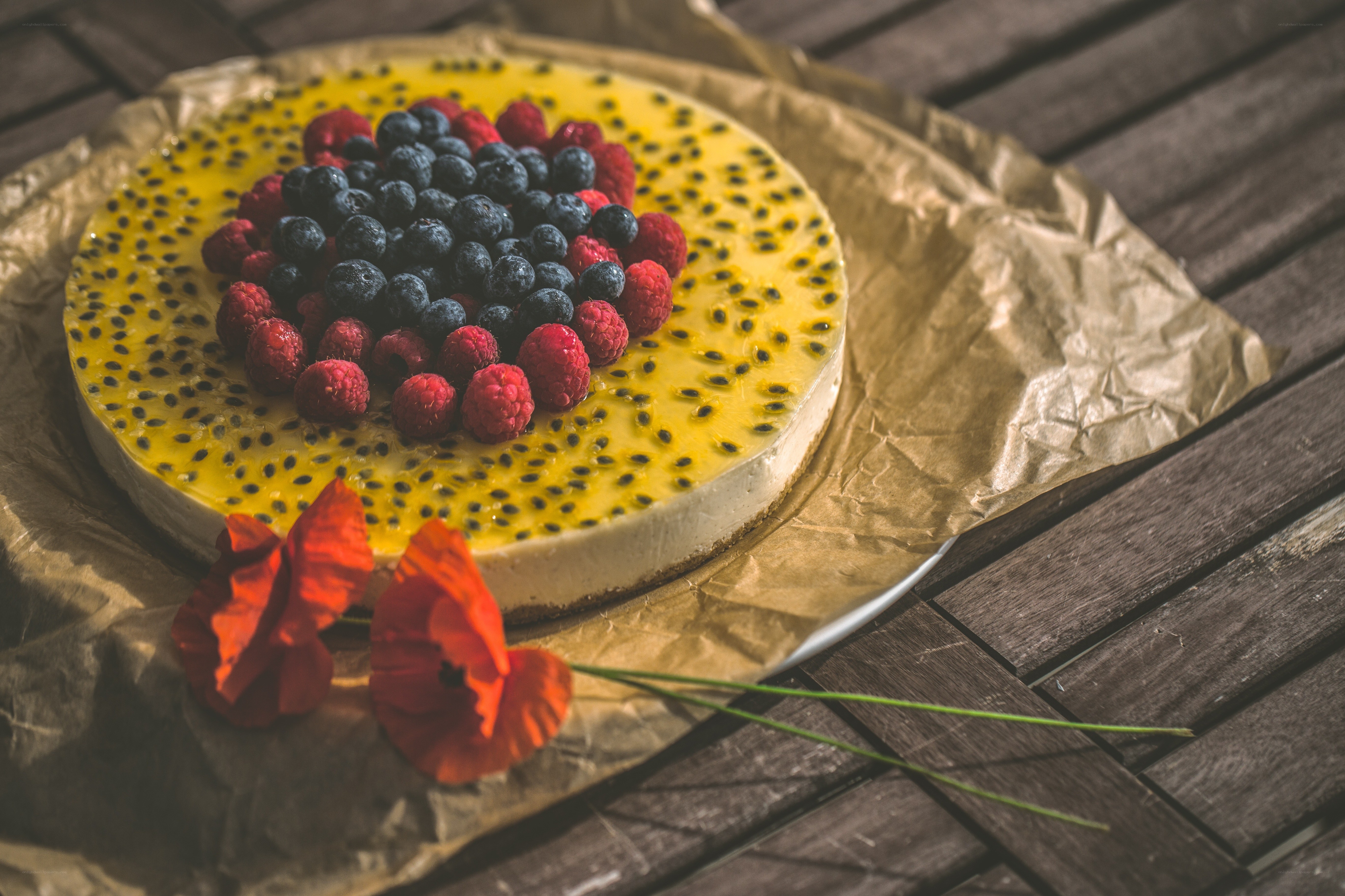 Passion fruit tart with berries