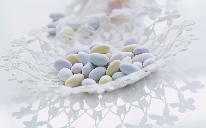 pastel candies on lace