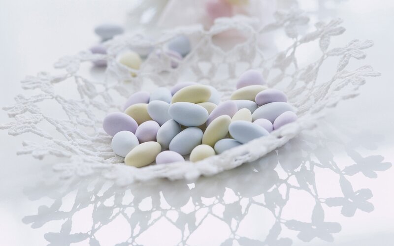pastel candies on lace