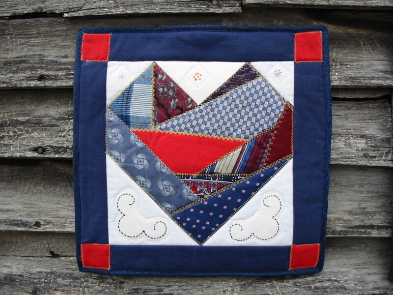 patchwork quilt with tie fabric