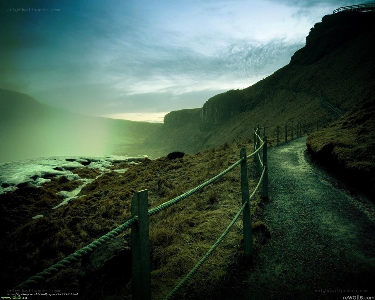 Path along a misty cliff
