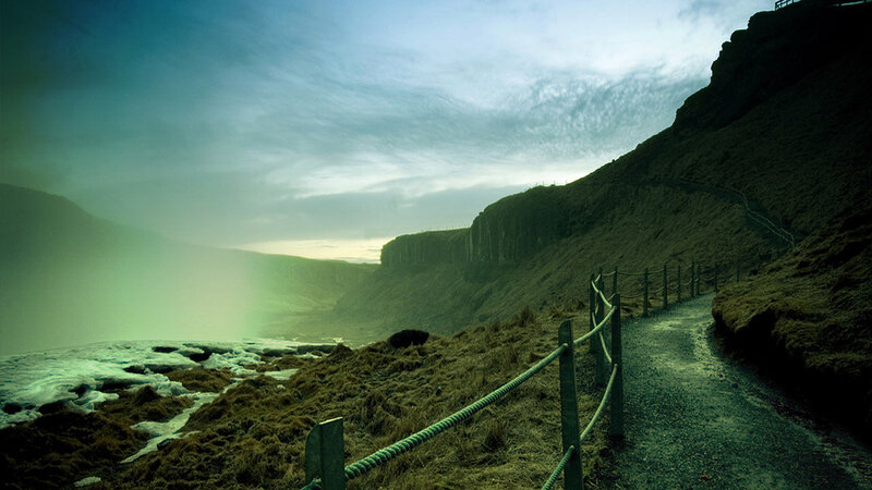Path along a misty cliffside