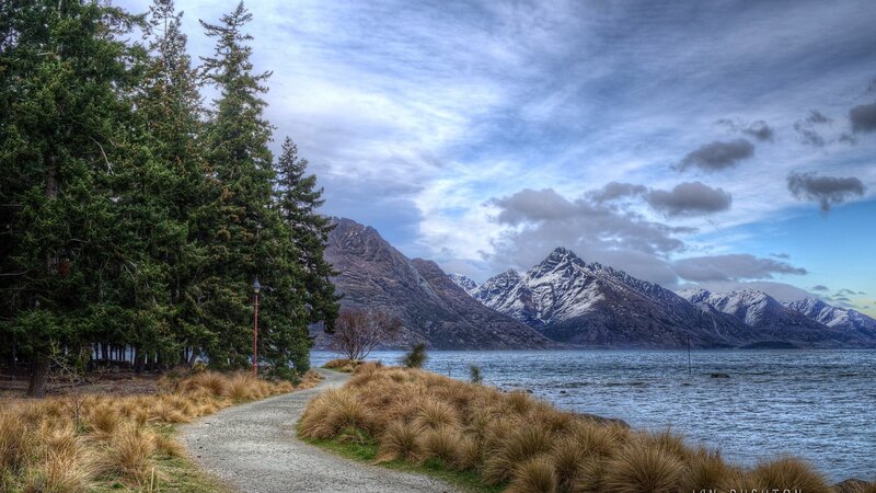 Path Along Lake with Mountains