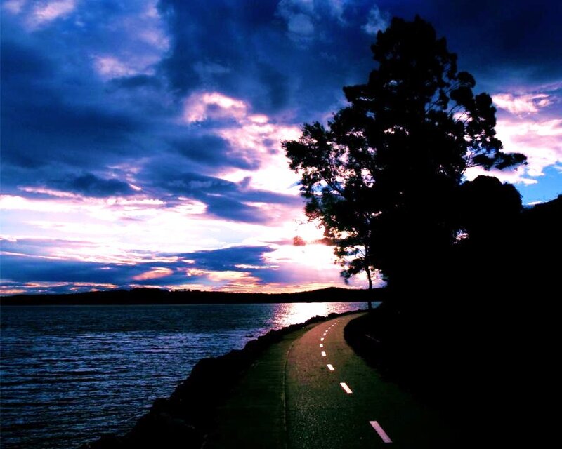 path along the water at sunset