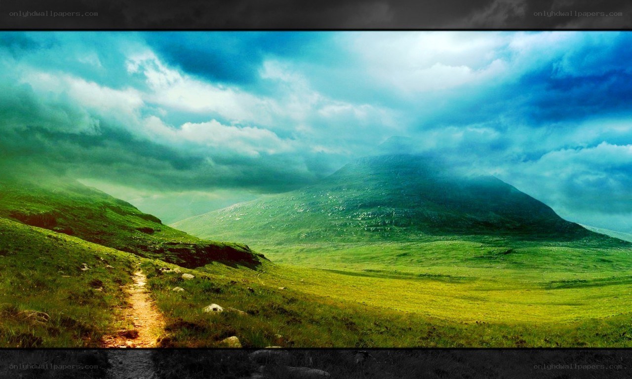 Path through green hills under stormy sky