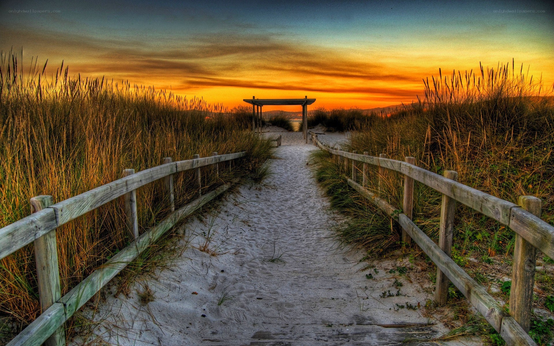 Path to the beach at sunset