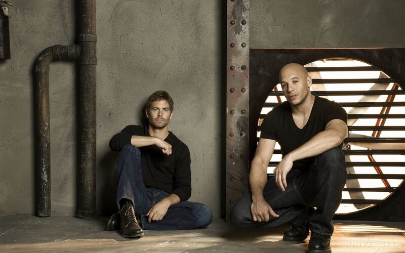 Paul Walker and Vin Diesel in industrial setting