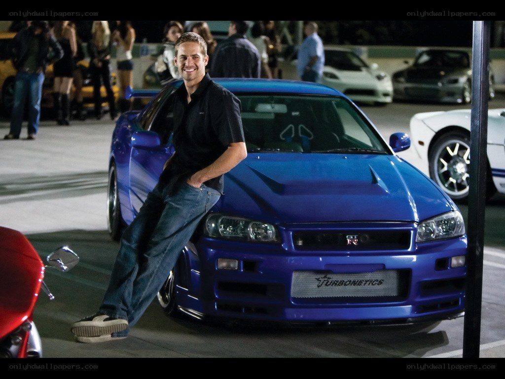 Paul Walker with blue car