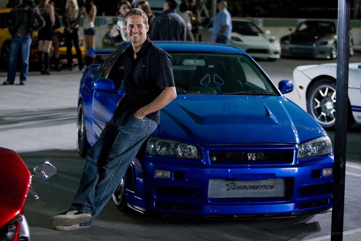 Paul Walker with blue car