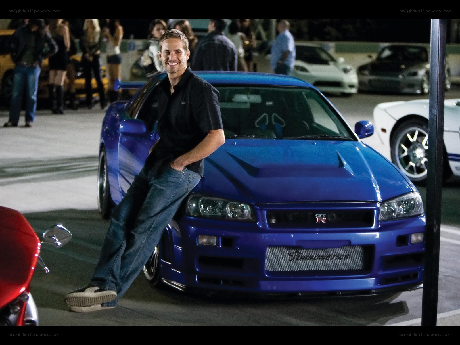 Paul Walker with blue car