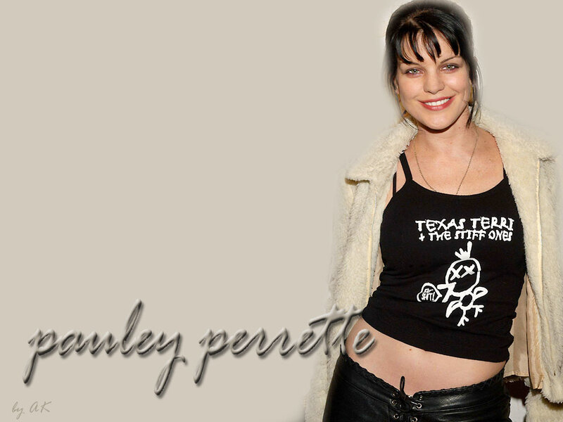 Pauley Perrette in a black tank top