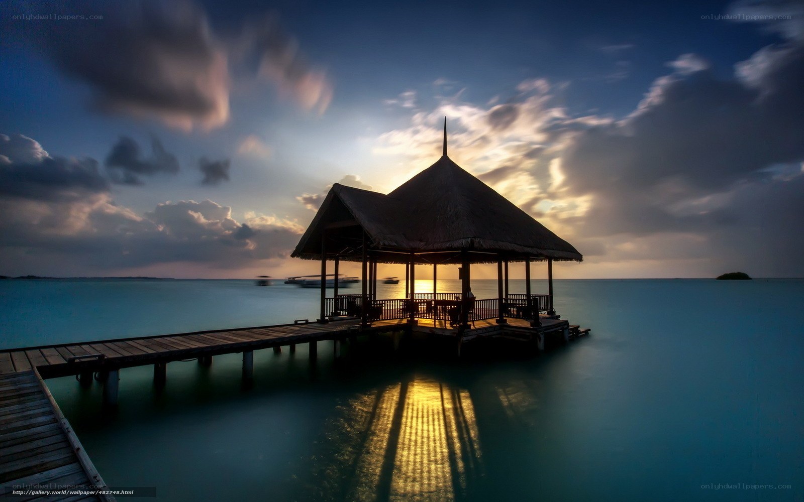 Pavilion at sunset over water