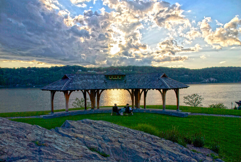 Pavilion by the river at sunset