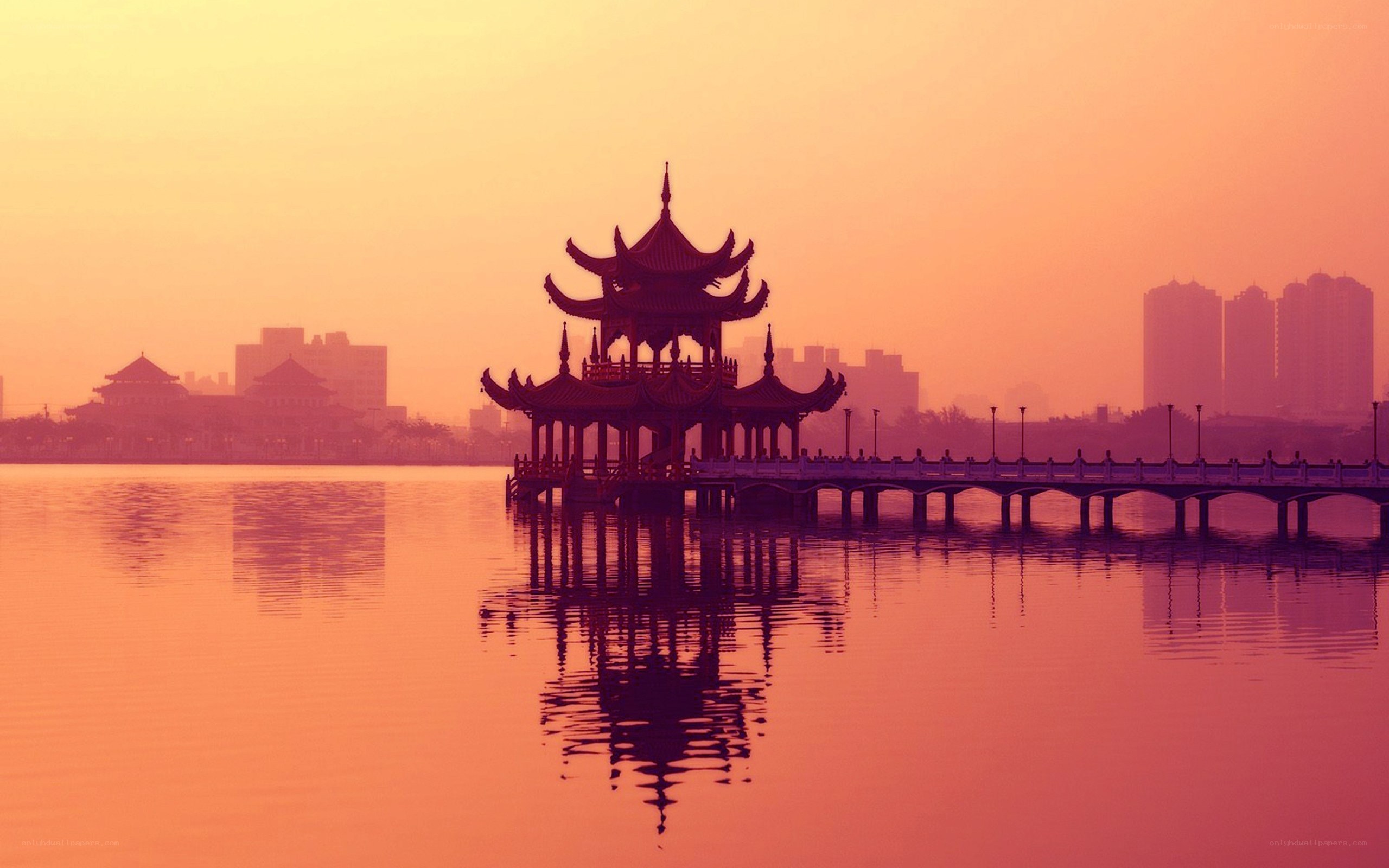 Pavilion on a lake at sunset