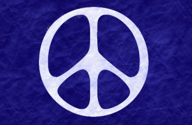 Peace Symbol on Blue Paper