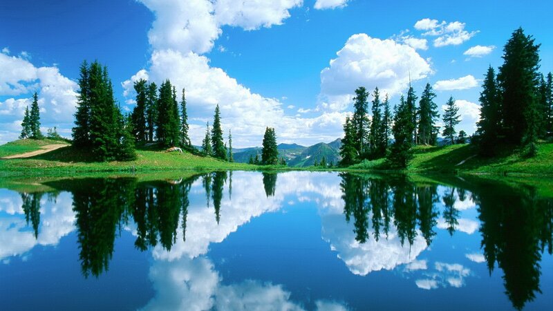 Peaceful lake with mountain reflection