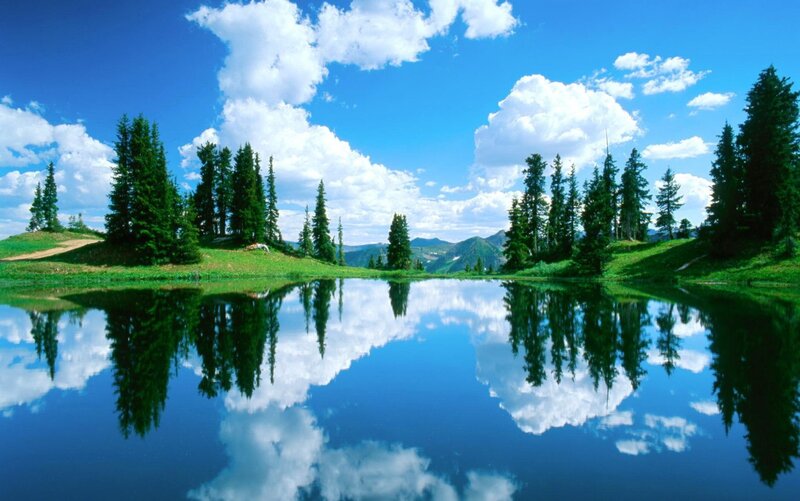 Peaceful lake with mountain reflection