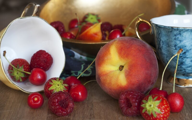 Peach and Berries on Wood