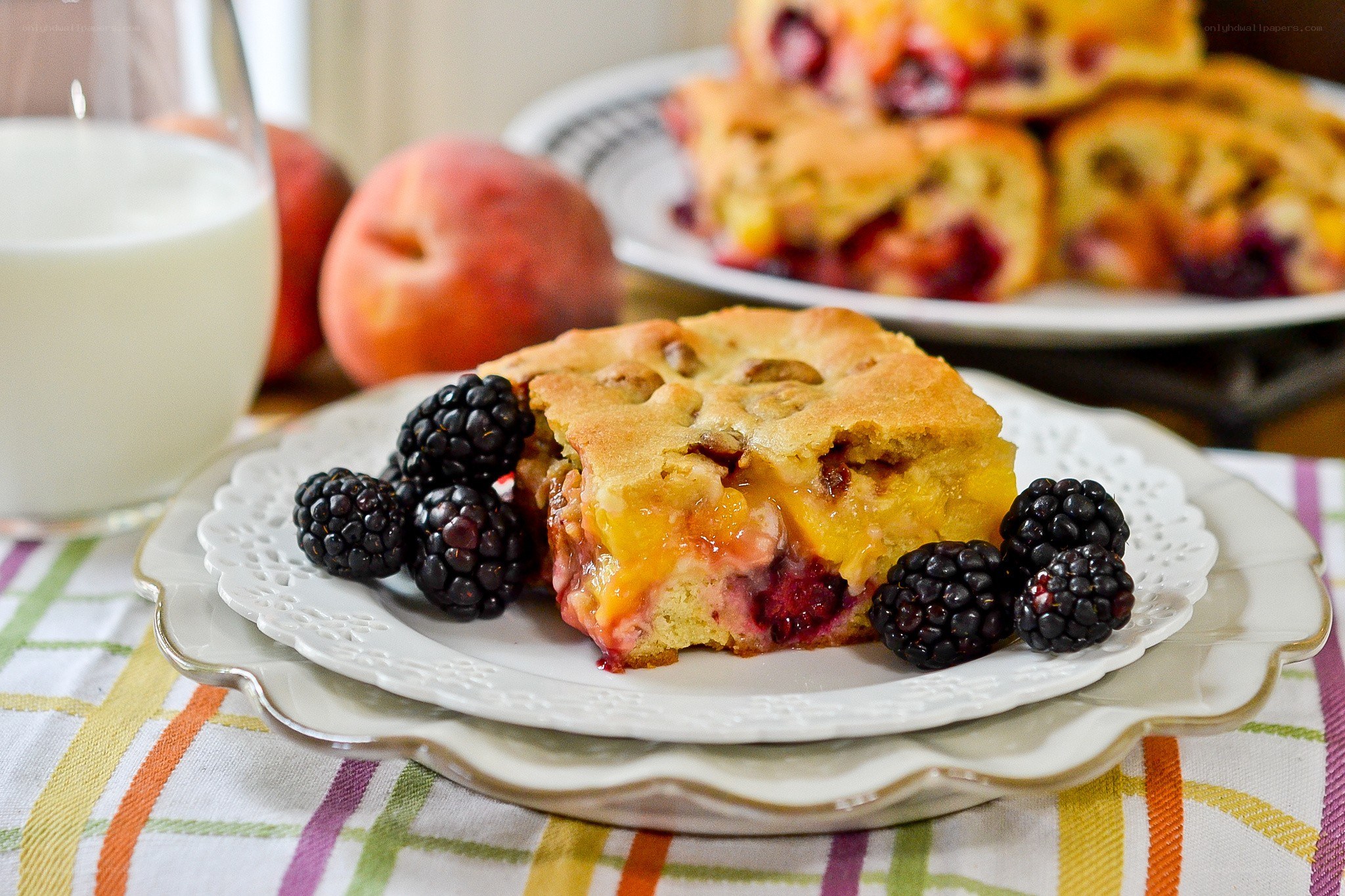 peach and blackberry pie slice