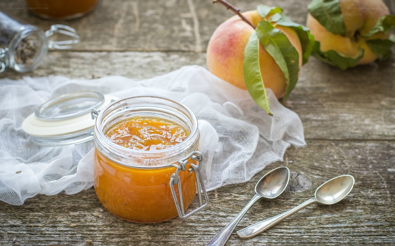peach jam on wooden table