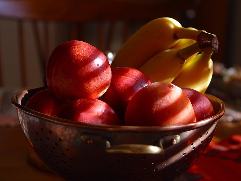 Peaches and Bananas in Colander