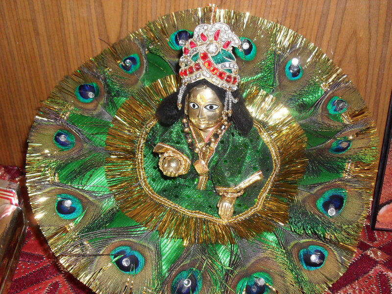 Peacock-feather Deity Display