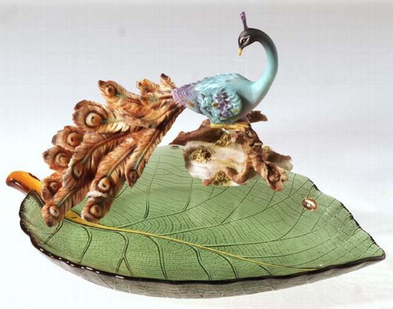 Peacock on a leaf sculpture